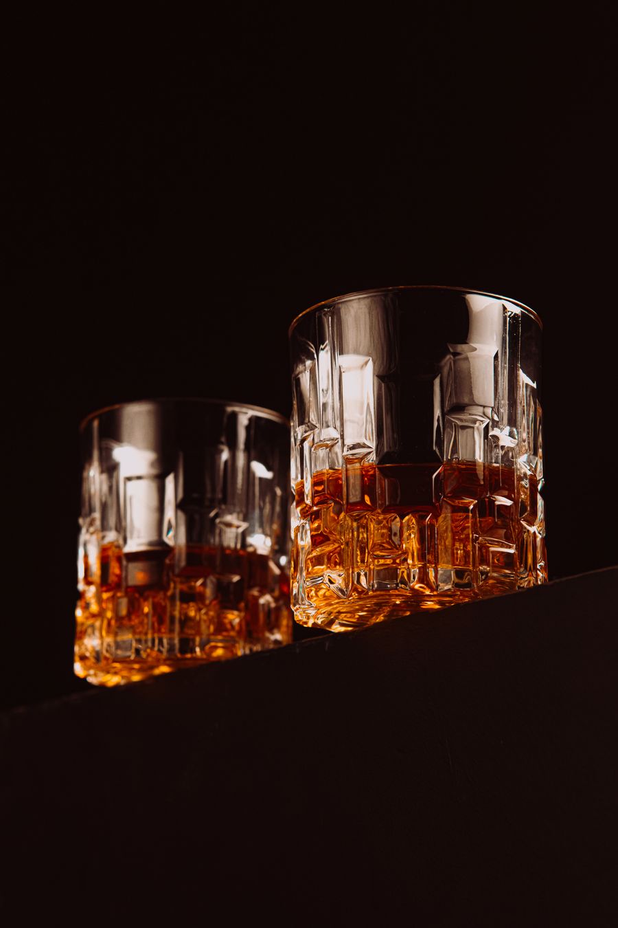 Whisky glasses on a dark background